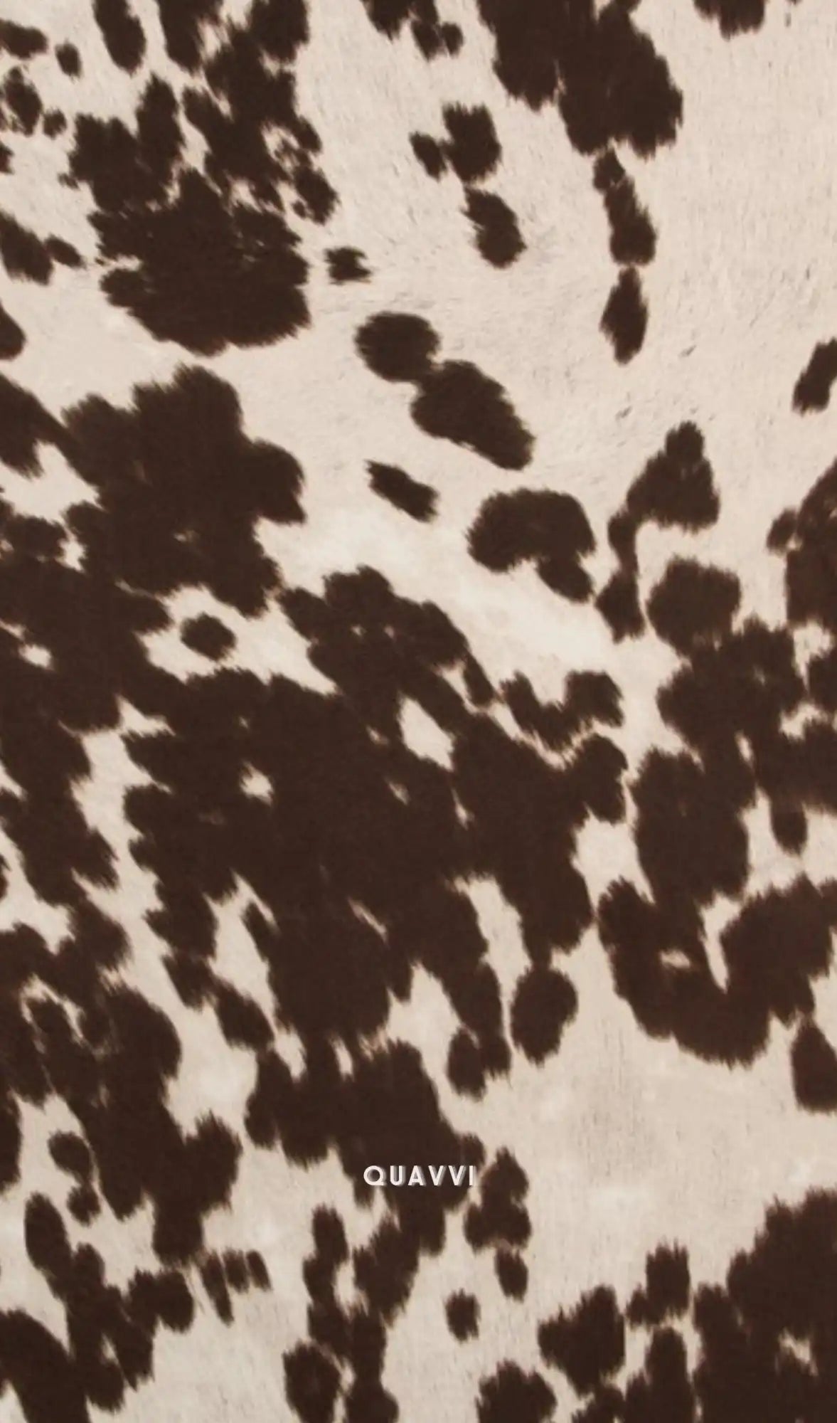 Brown and white cowhide pattern.