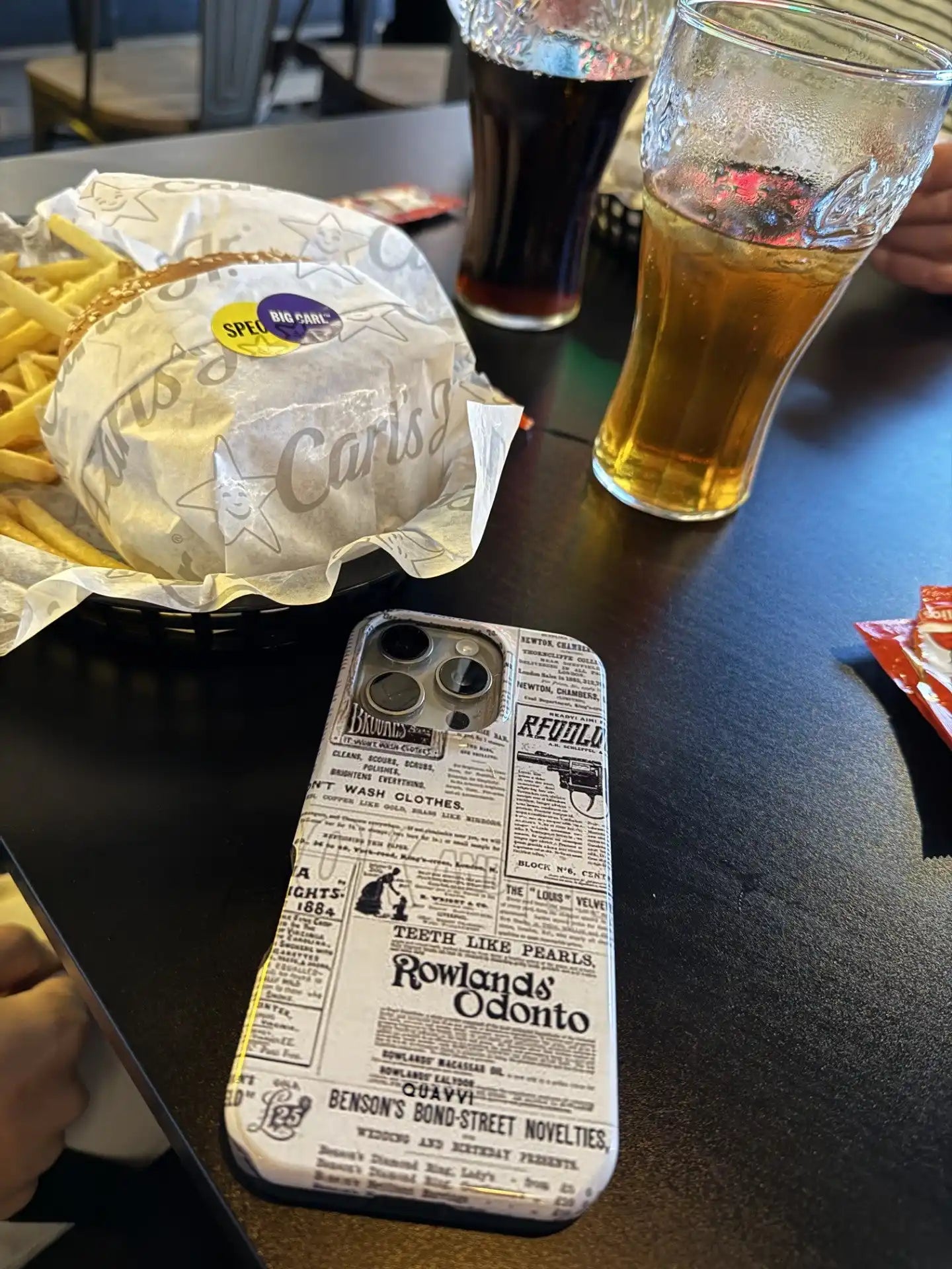 Newspaper-print iPhone case.