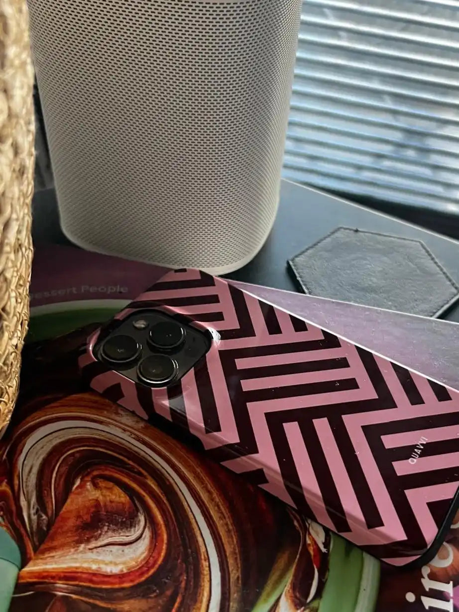 Pink and black patterned phone case.
