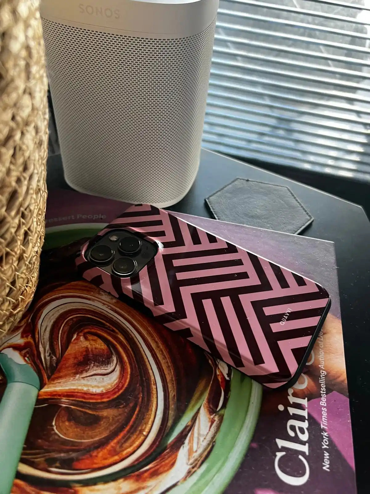 Pink and black patterned phone case.