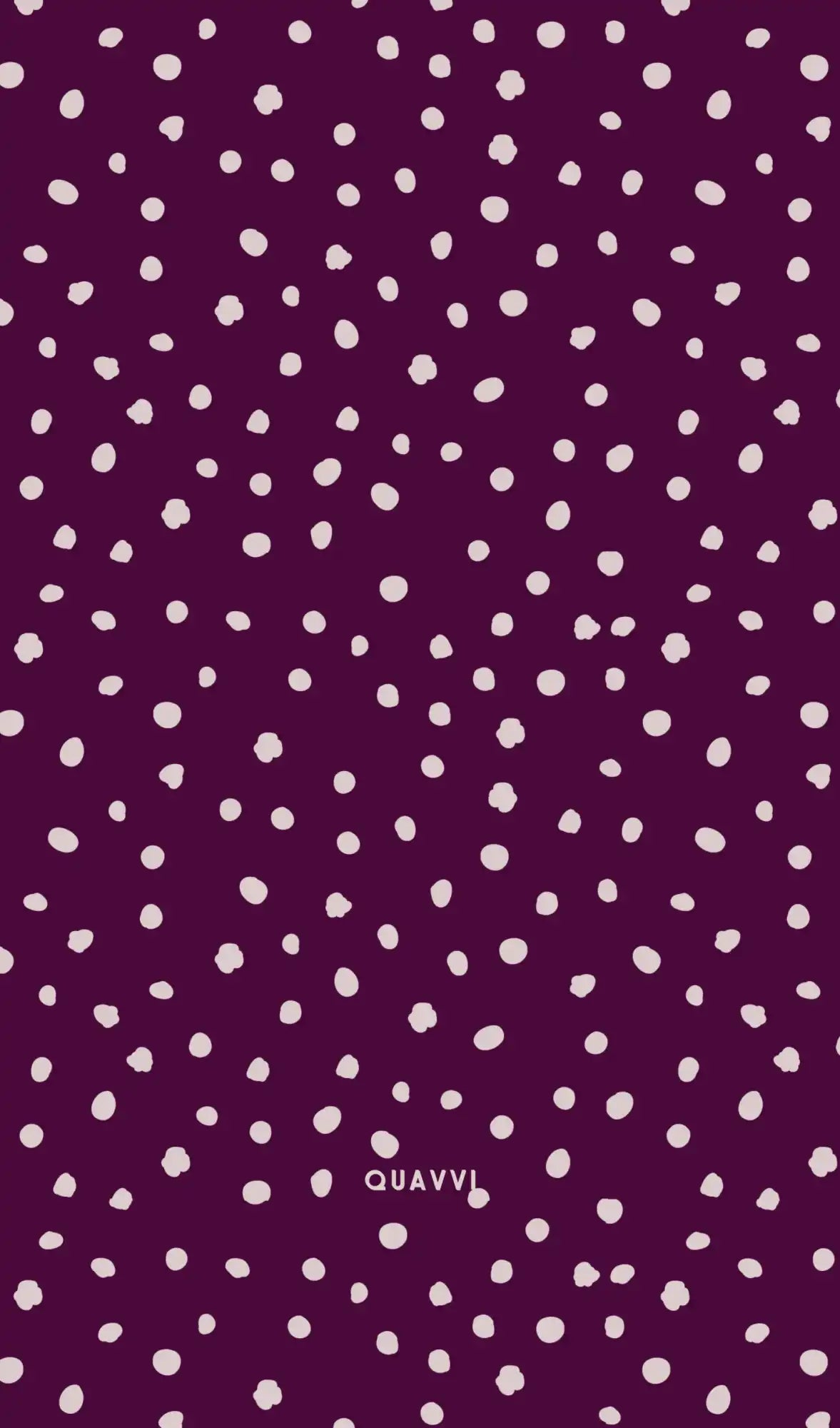 Purple fabric with white polka dots.
